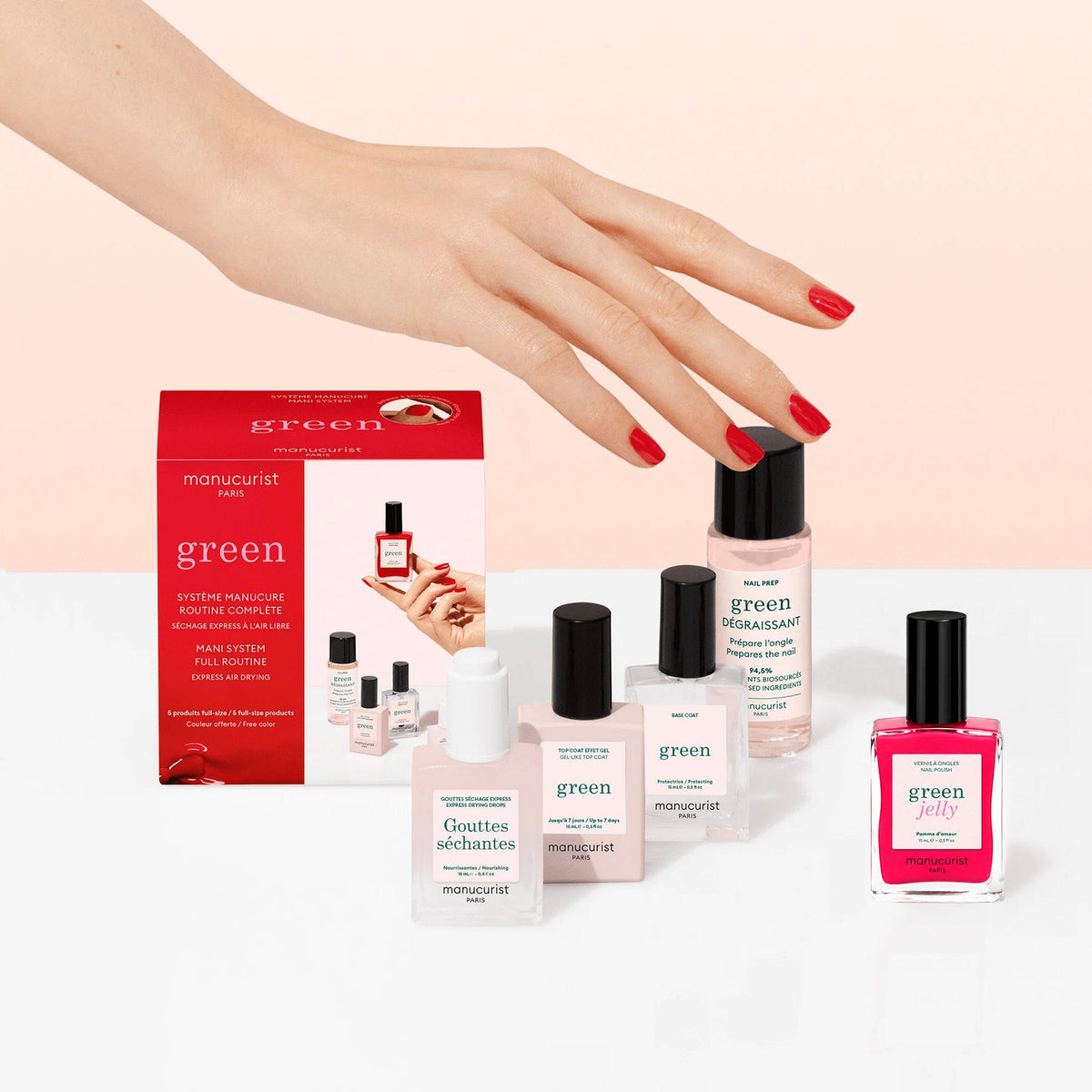 The Manucurist Discovery Kit - Jelly Nail Polish features five plant-based nail care essentials—jelly polish, base coat, remover, top coat, and drying drops—in a stylish red and white box for the perfect green manicure.