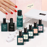 The Manucurist Super Starter Kit - Soap Nails LED Gel Polish includes a light pink zippered pouch, a white LED lamp, remover, five colored polishes, a vitaminized base coat, a top coat, and five white nail clips for an ultra-glossy manicure.